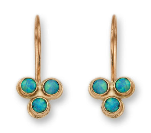 Gold earrings set with opals