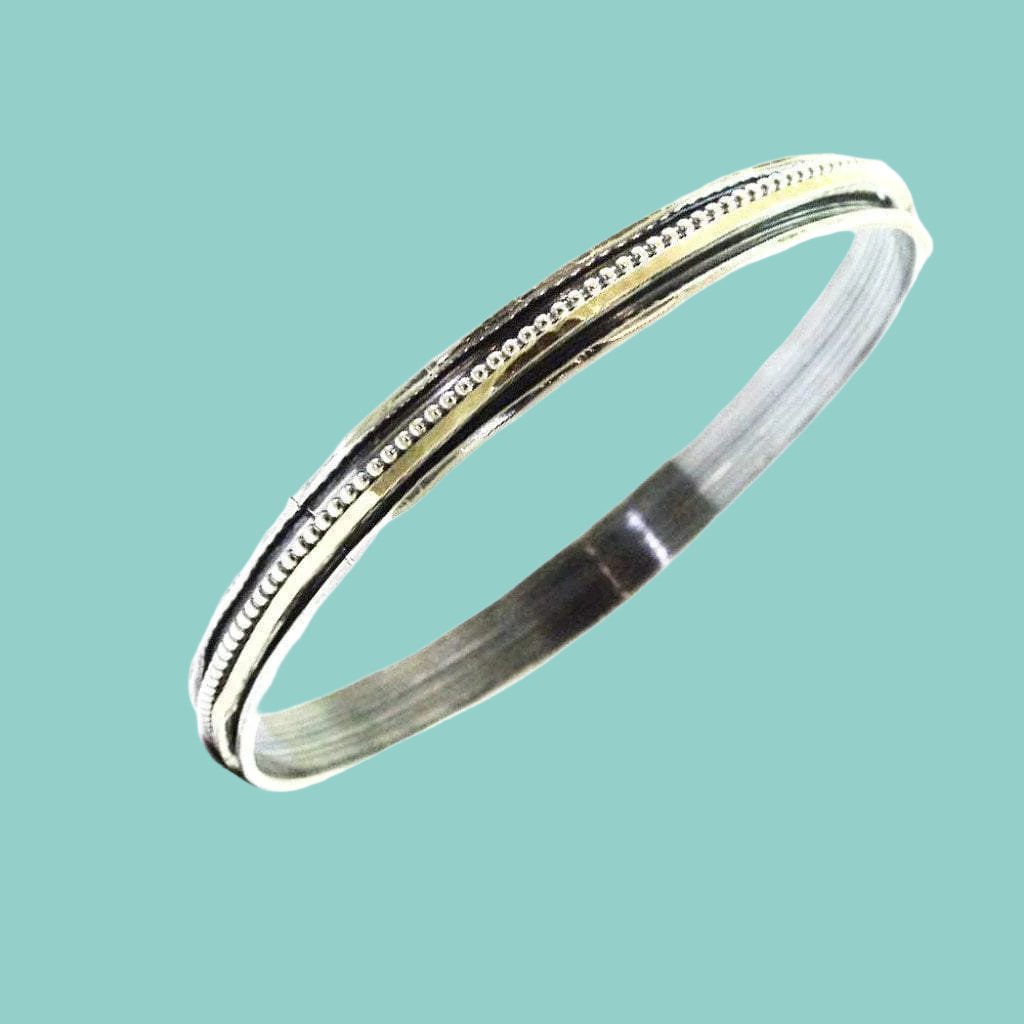 Sterling Silver and Gold Spinner Bangles, Designer Bangle Bracelets. - Bluenoemi