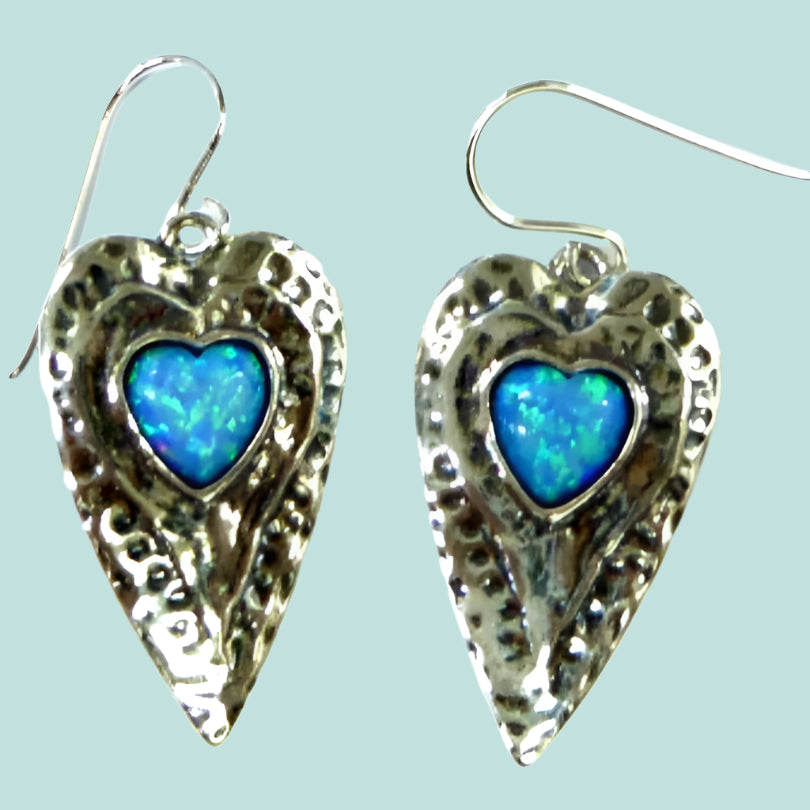 Sterling silver heart earrings set with blue opals. - Bluenoemi