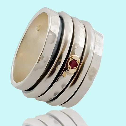 Spinner Ring Jewelry. Sterling Silver and 9kt gold Ring set with Garnet - Bluenoemi