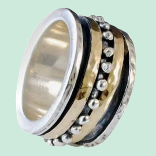 Sterling Silver & Gold 9KT Spinner ring for woman. Boho chic Meditation ring. - Bluenoemi