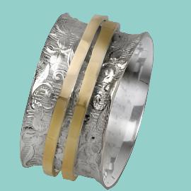 Spinning Ring Jewelry. Sterling Silver and 9kt Gold Ring. - Bluenoemi