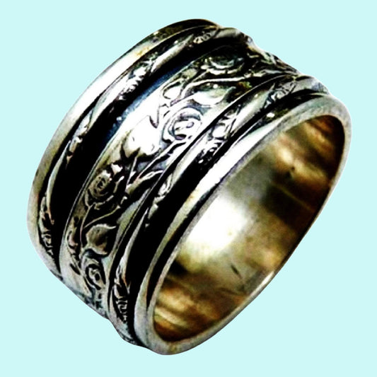 Sterling Silver Spinner ring designer jewelry floral Israeli rings - Bluenoemi