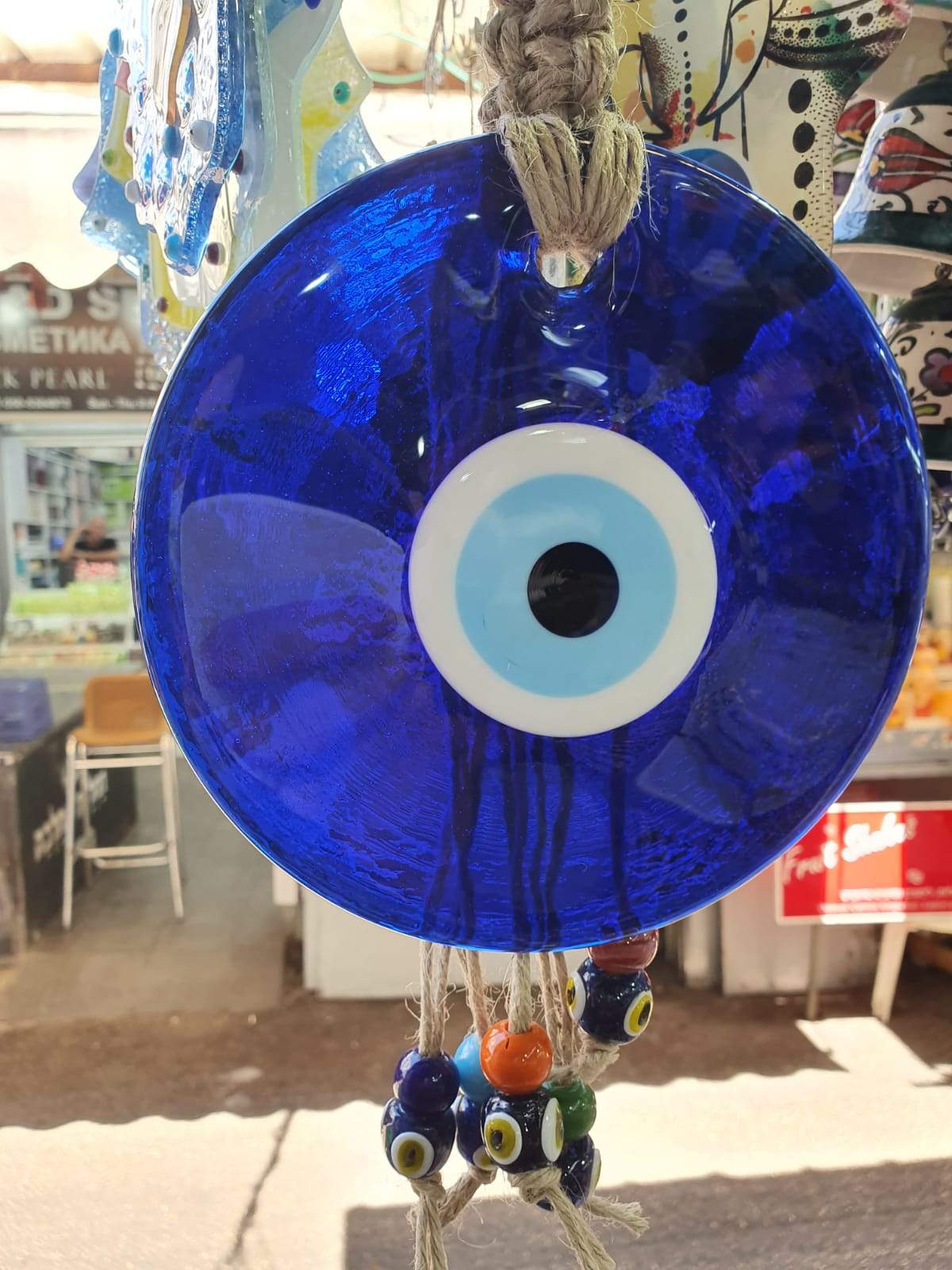 Evil Eye Blue Glass Souvenir Luck and Blue Eyes Symbols and beads on a rope. - Bluenoemi